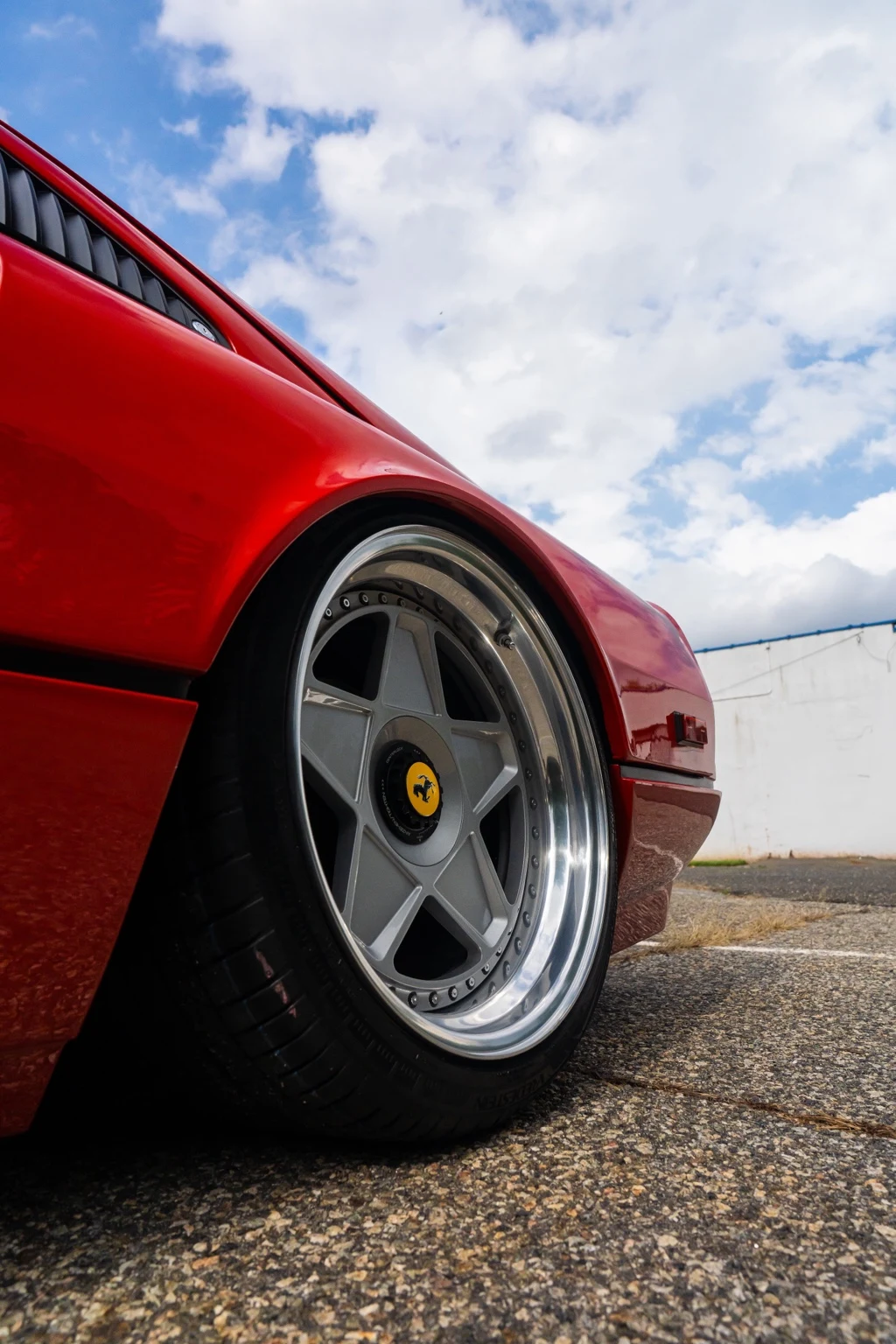 Rear-quarter bodywork and AG Luxury wheel on the featured Ferrari build