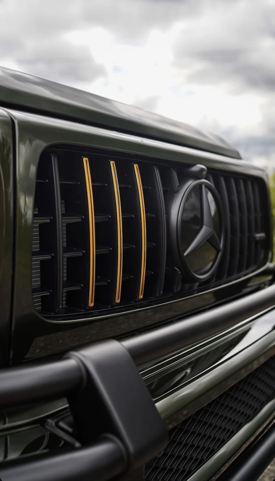 Mercedes-AMG grille with yellow accent stripes